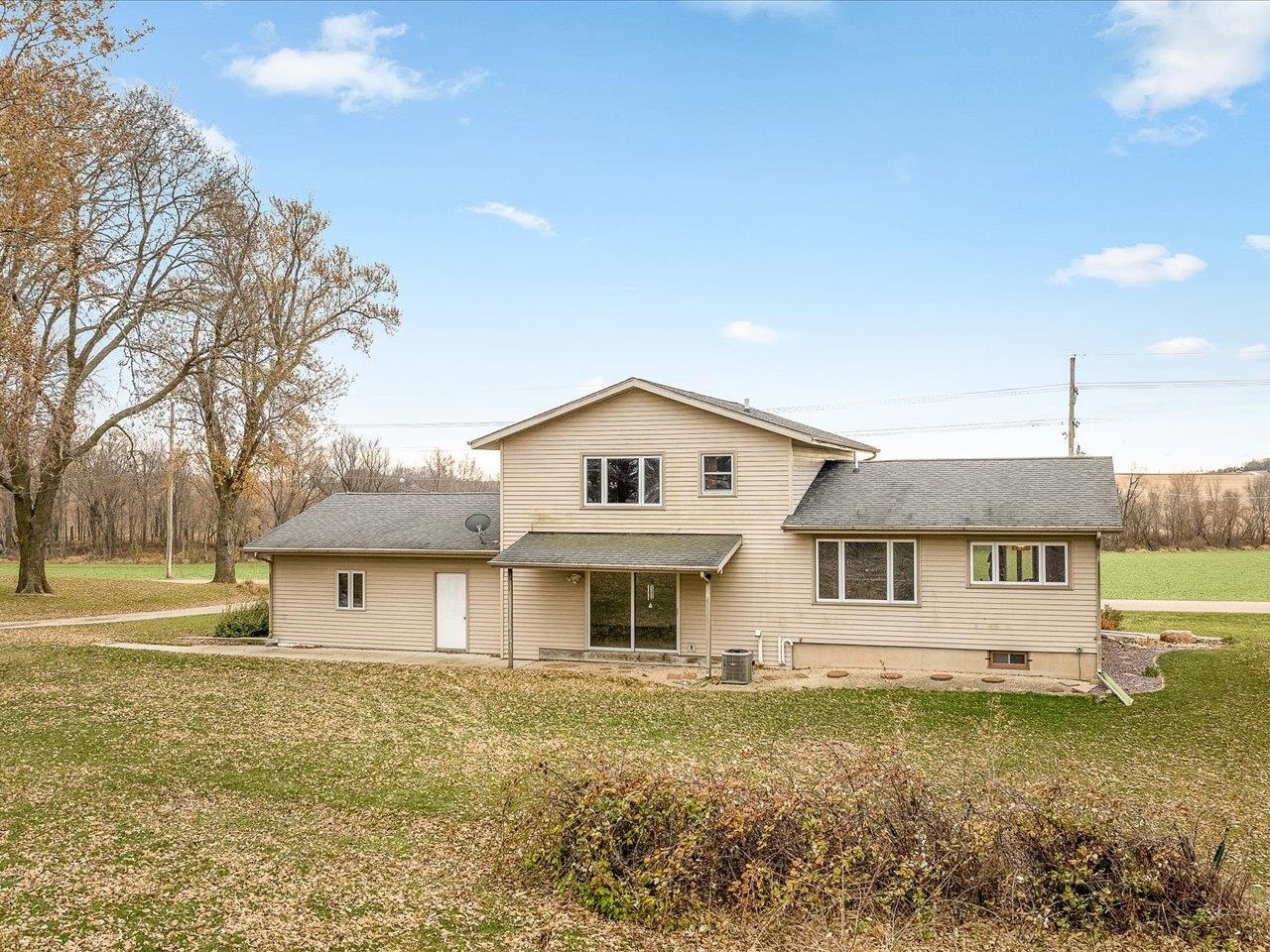 2110 East Angle Road Dakota, IL 61018 - Photo 44 of 47 a front view of a house with a yard