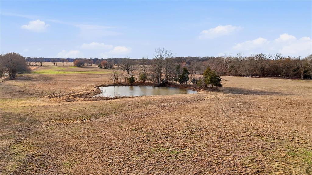 36200 County Line Road Sumner, TX 75486 - Photo 15 of 25 a view of a lake with houses in the back