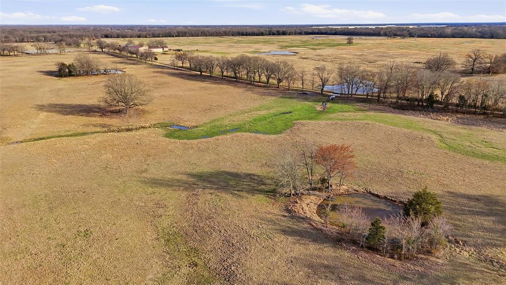 36200 County Line Road Sumner, TX 75486 - Photo 4 of 25 a view of an ocean with city