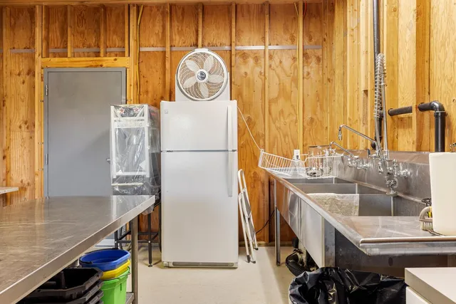 a view of a park with large trees