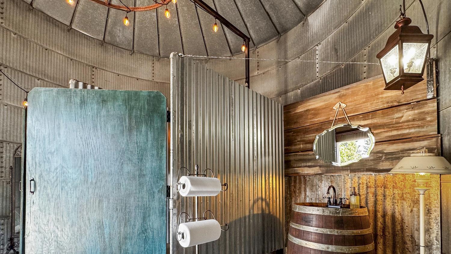 4742 Crow Road Oakdale, CA 95361 - Photo 78 of 95 a bathroom with a sink and a mirror