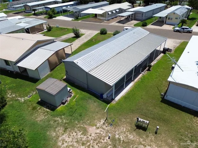 an aerial view of a house with a garden