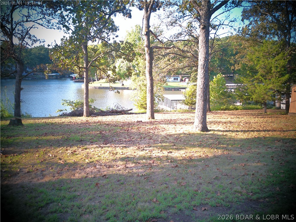 1814 Sagrada Road Edwards, MO 65326 - Photo 4 of 62 View from Back deck to Lake and Boat Dock (ideally