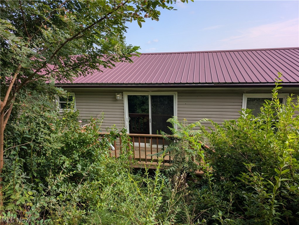 10811 Freedom Road Kimbolton, OH 43749 - Photo 3 of 38 Small deck off the back of the house