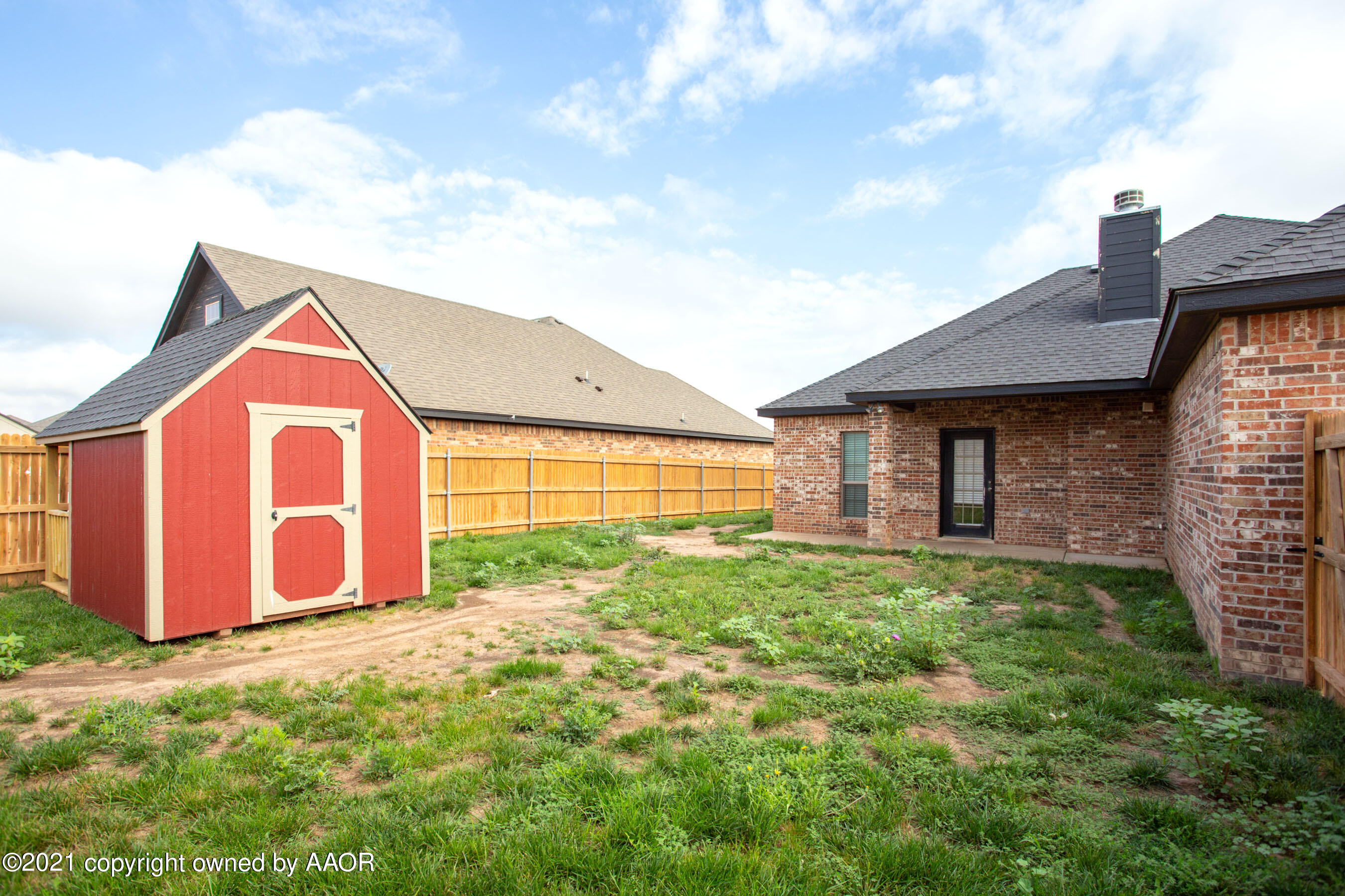 9907 Asher Avenue Amarillo, TX 79119 - Photo 23 of 24 a view of backyard of house