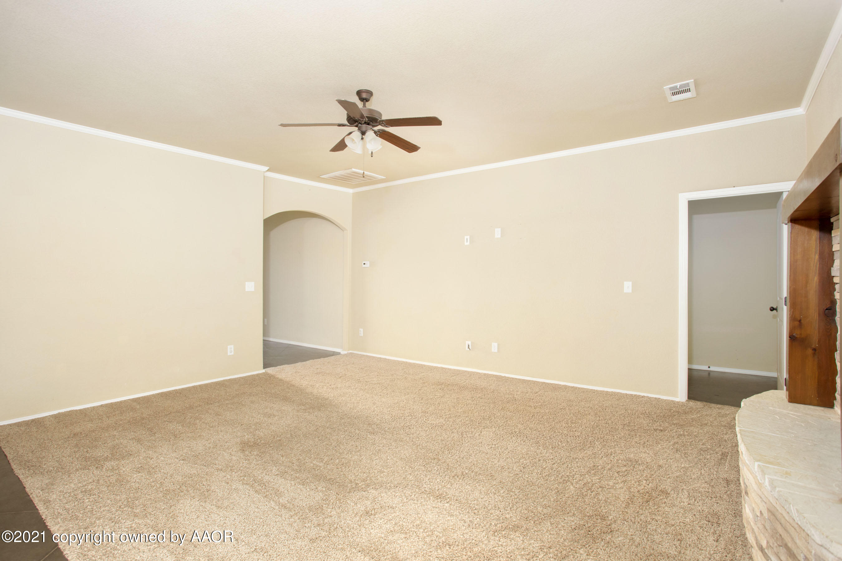 9907 Asher Avenue Amarillo, TX 79119 - Photo 6 of 24 a view of a big room with carpet