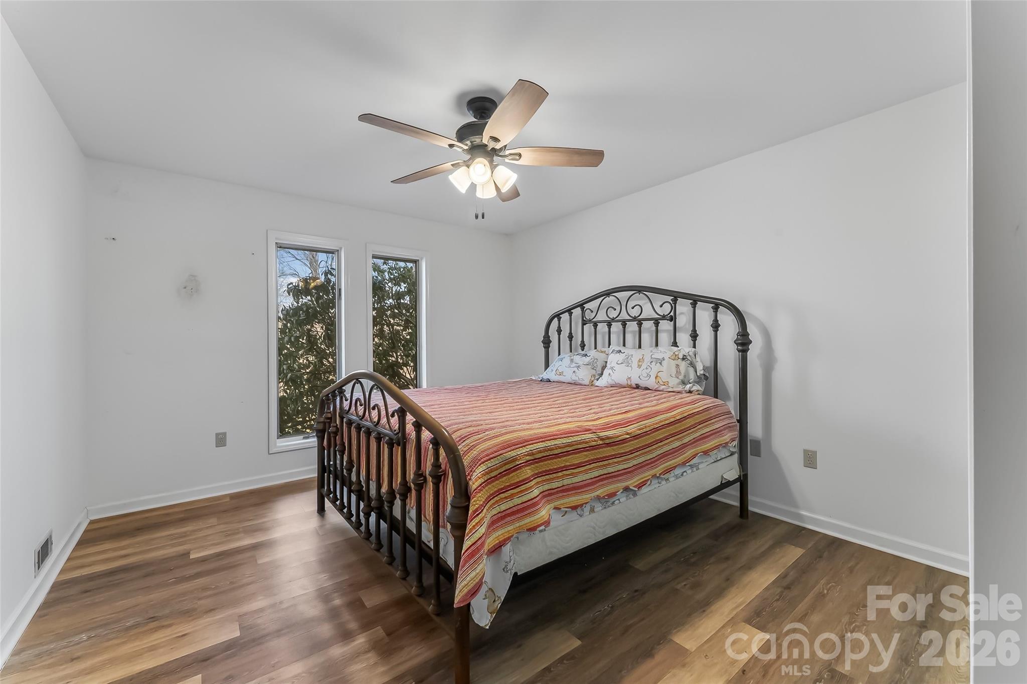 2590 Airport Road Marion, NC 28752 - Photo 17 of 48 a bedroom with a bed next to a window