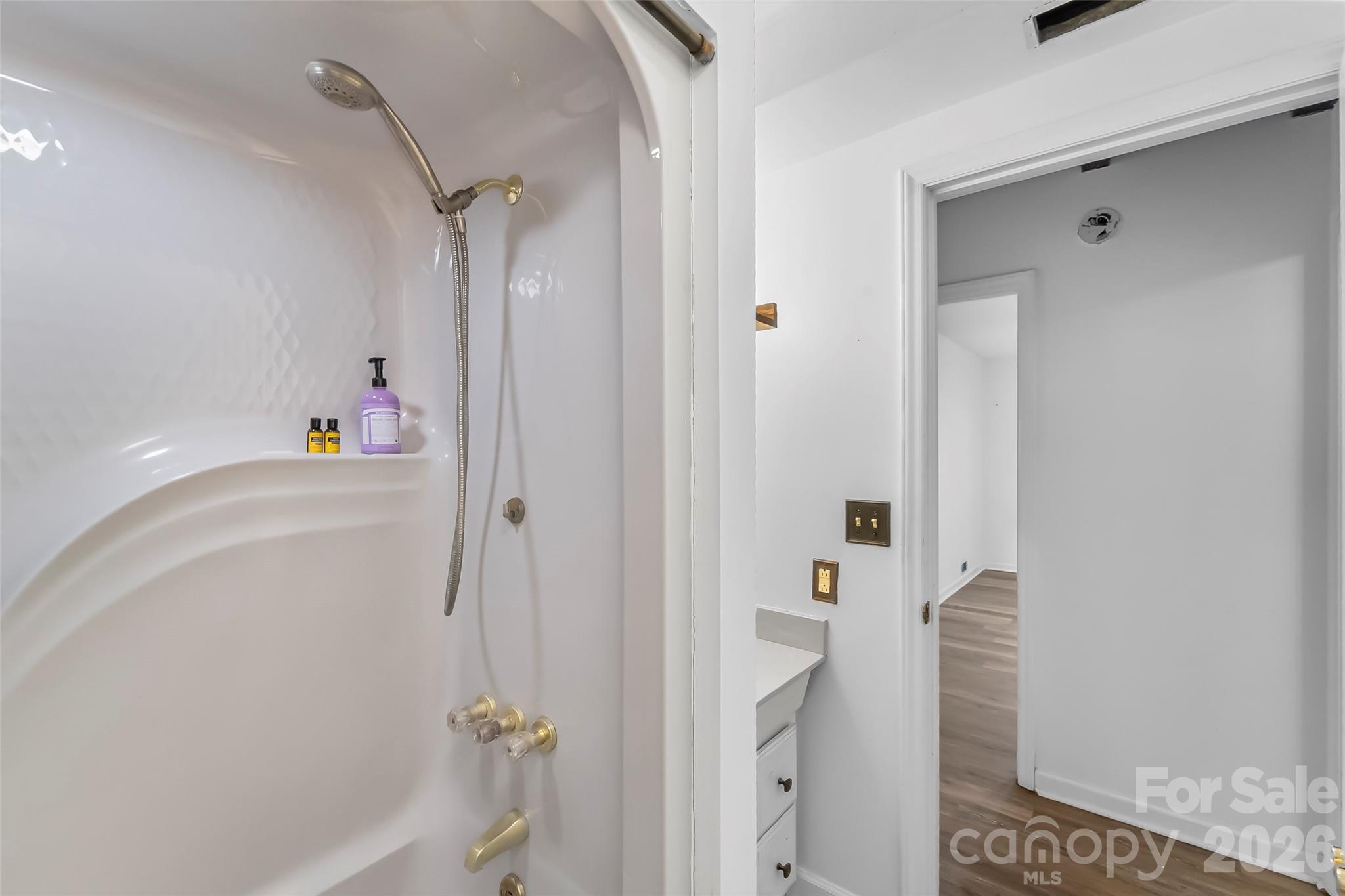 2590 Airport Road Marion, NC 28752 - Photo 19 of 48 a bathroom with a bathtub and a shower