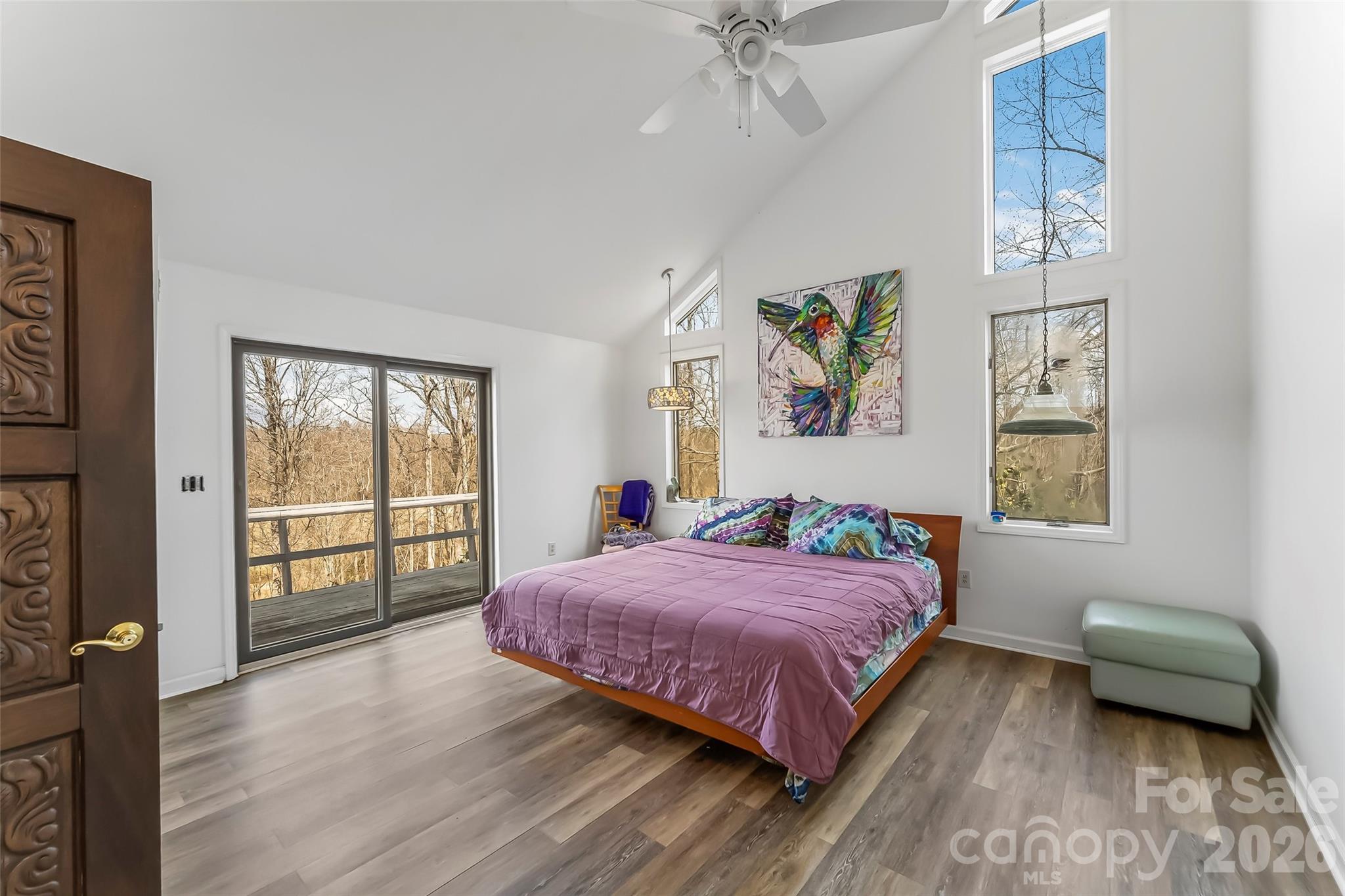2590 Airport Road Marion, NC 28752 - Photo 23 of 48 a bedroom with a bed a couch and a window
