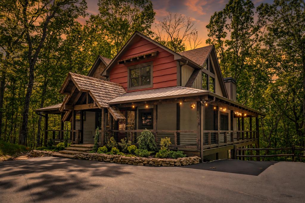 895 Price Road Blue Ridge, GA 30513 - Photo 67 of 140 a front view of a house with garden