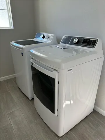 a utility room with dryer and washer