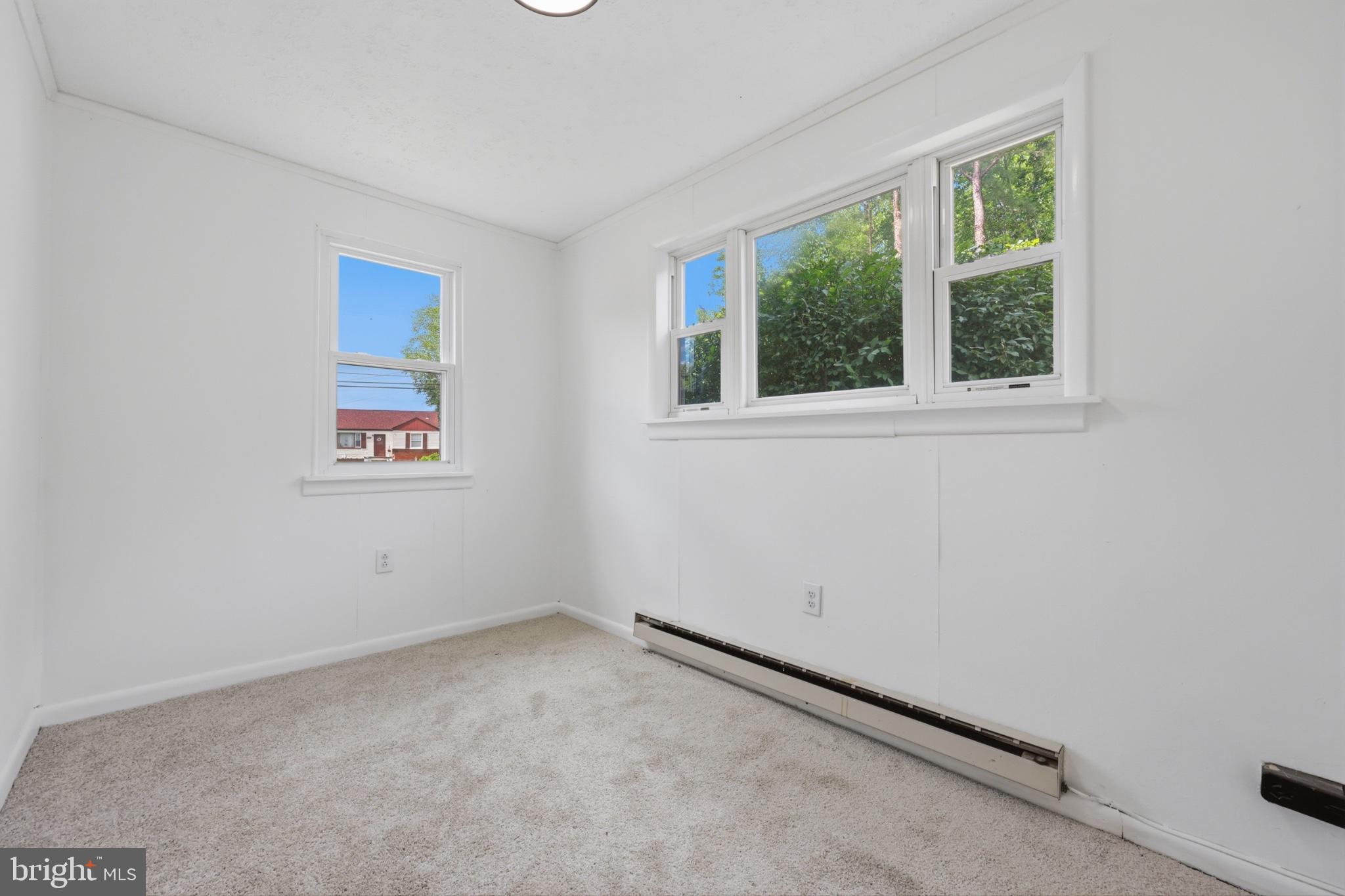 8251 Marshall Corner Road Pomfret, MD 20675 - Photo 18 of 20 Bright and airy room with windows.