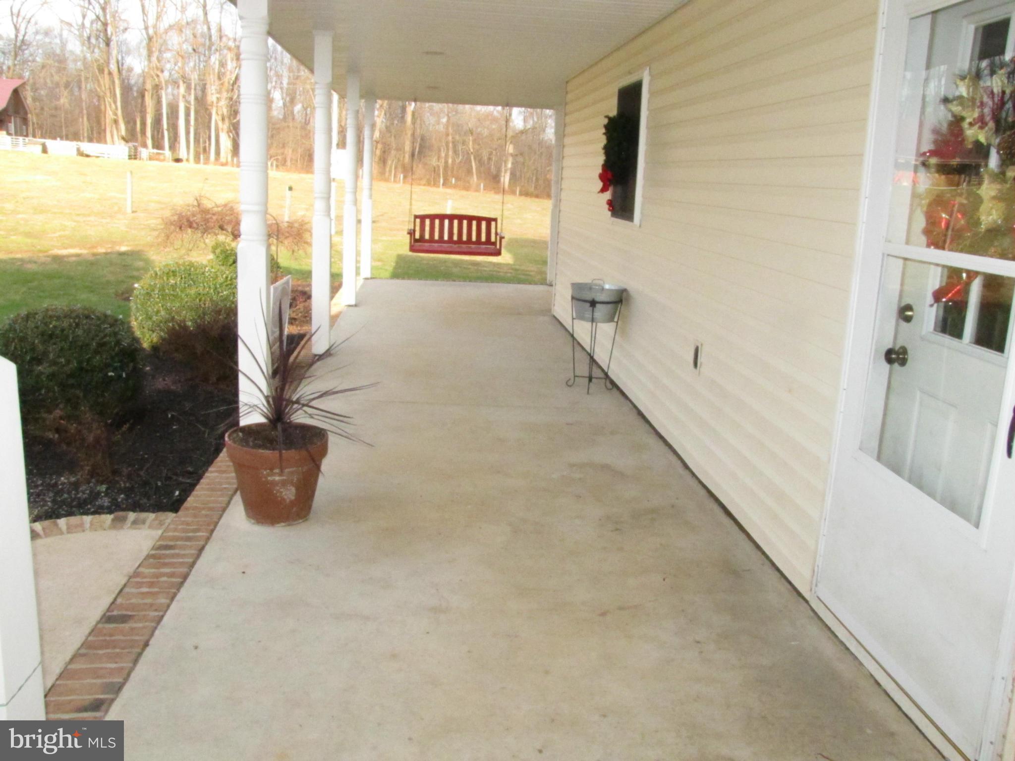 226 Weaver Meadows Road Conowingo, MD 21918 - Photo 21 of 30 Wraparound Porch