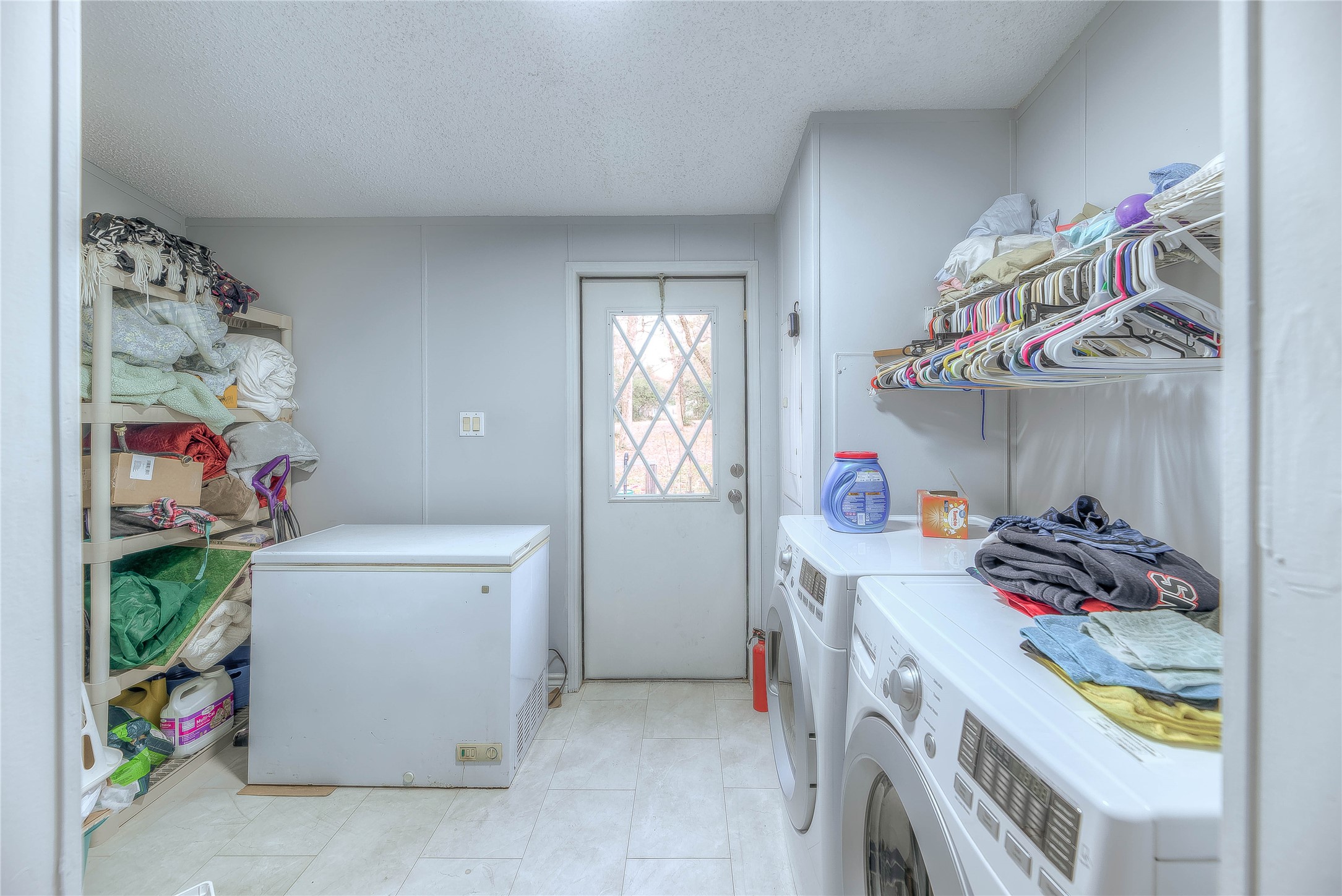 17709 Pine View Drive Conroe, TX 77302 - Photo 18 of 26 a room with storage and utility