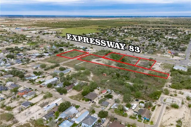 a view of city with ocean