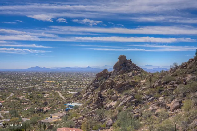 a view of a city with an ocean