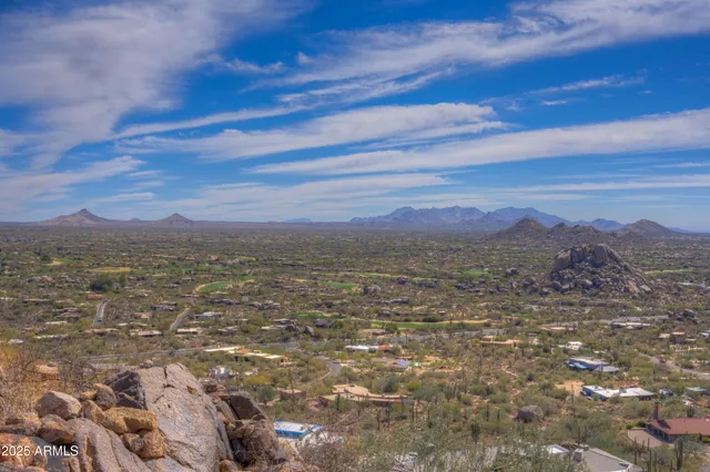 a view of mountains and valleys
