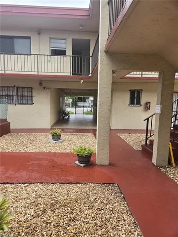 a view of a hallway to a house
