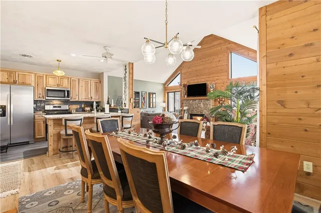 a kitchen with a stove a sink and a refrigerator