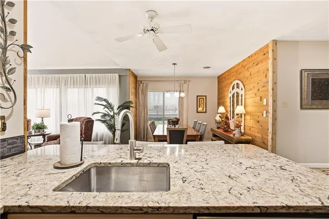 a living room with fireplace furniture and a flat screen tv