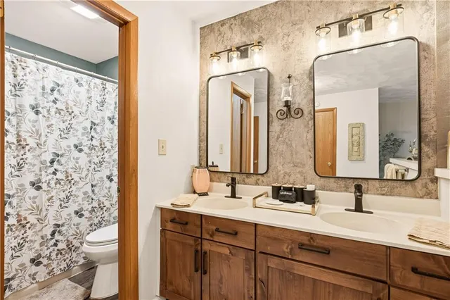 a view of a livingroom with furniture and front door