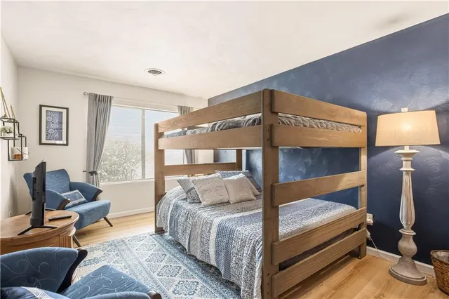 a bed room with a bed and a couch