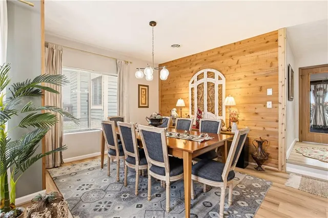 a view of a livingroom with furniture and window