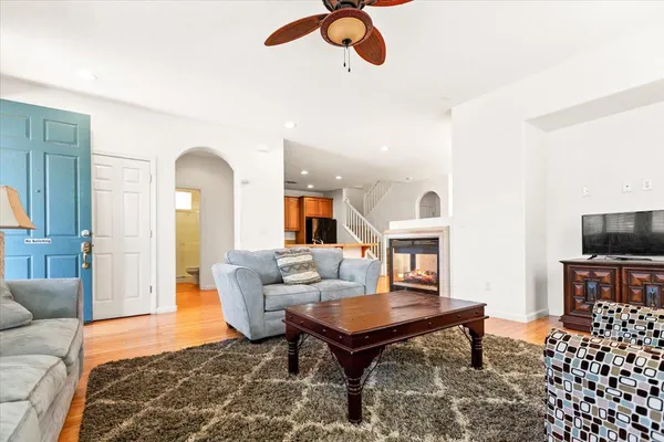 a kitchen with stainless steel appliances granite countertop a stove top oven a sink and dishwasher