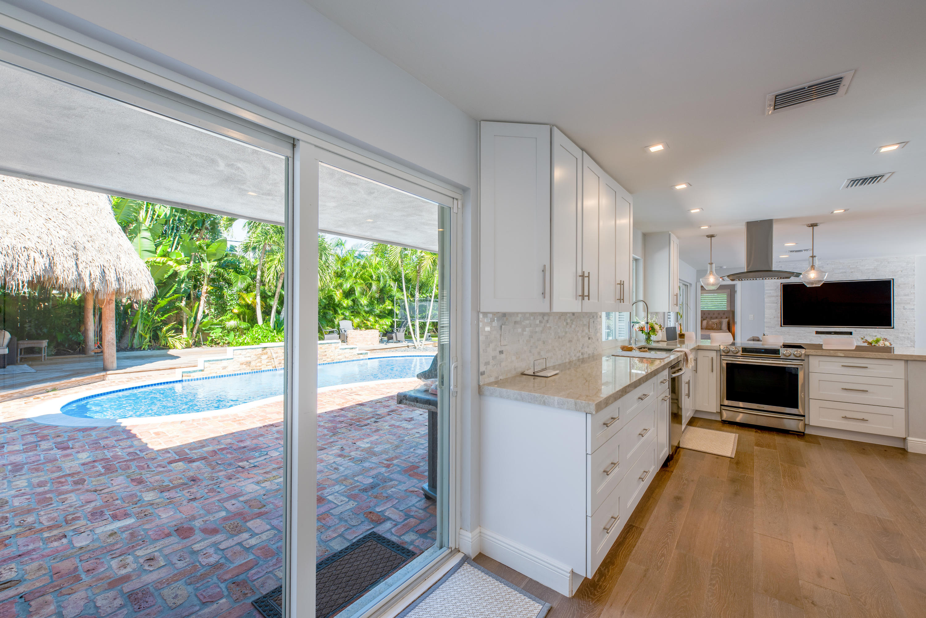 757 Southwest 7th Street Boca Raton, FL 33486 - Photo 11 of 48 Kitchen-To-Back-Yard