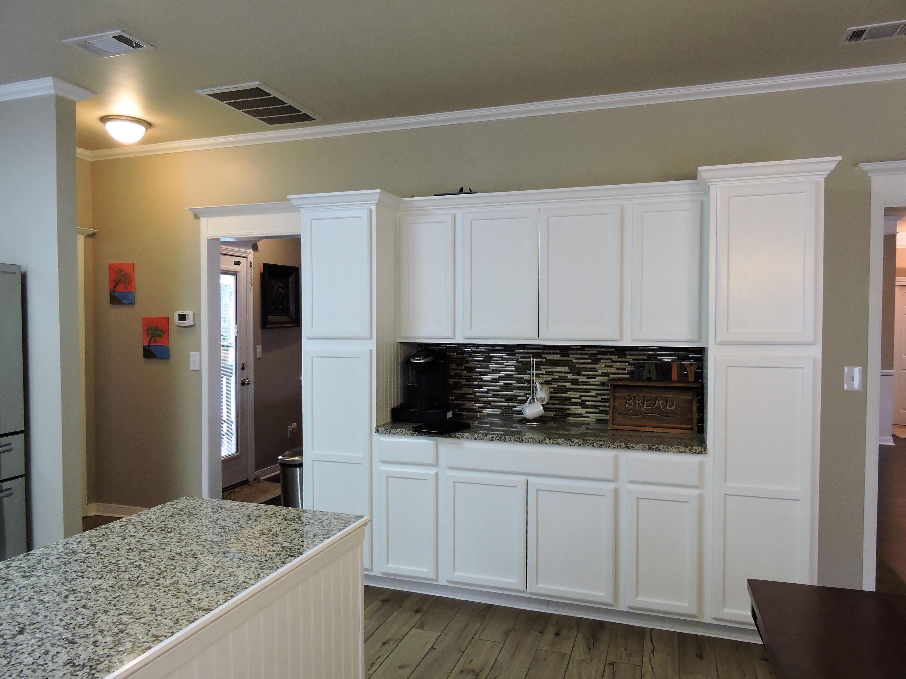 4458 Kingslynn Road Niceville, FL 32578 - Photo 8 of 37 a kitchen with stainless steel appliances granite countertop a refrigerator and a sink