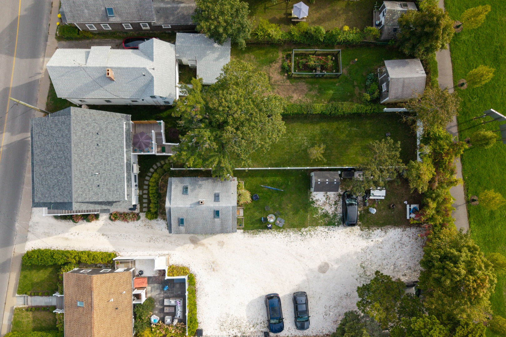 33 Lagoon Pond Road Vineyard Haven, MA 02568 - Photo 40 of 42 an aerial view of houses with yard