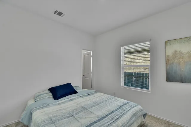 a living room with furniture kitchen view and kitchen view