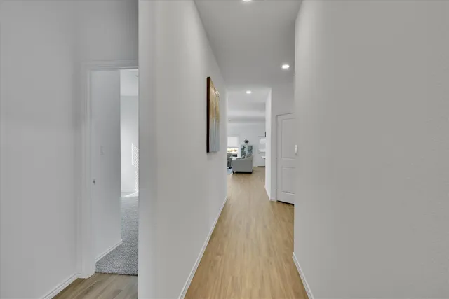 a bedroom with a bed and a sink