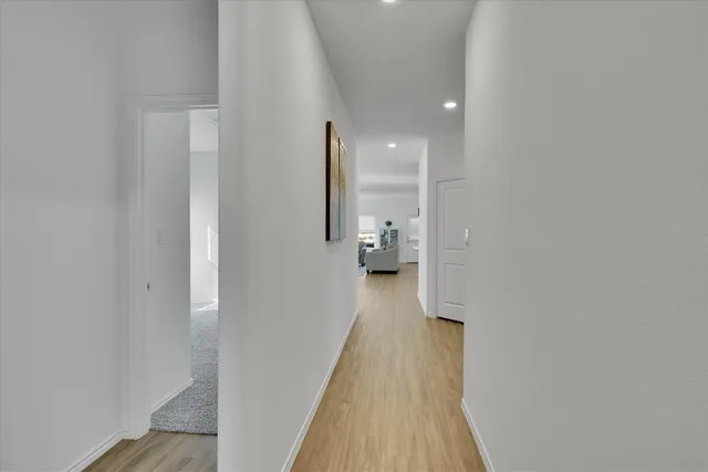 a bedroom with a bed and a sink