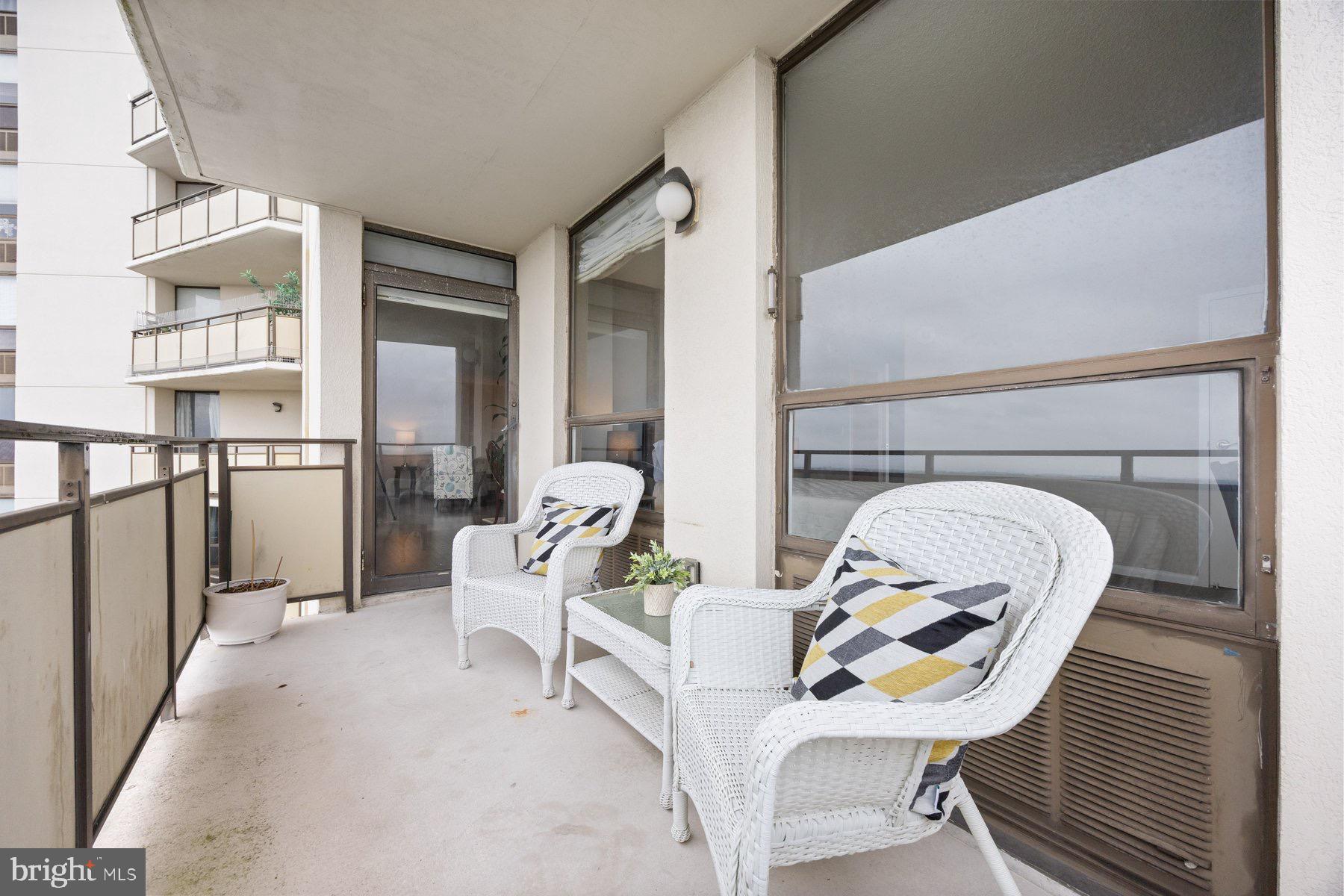 205 East Joppa Road, Unit 2403 Towson, MD 21286 - Photo 10 of 48 a view of a livingroom with furniture and a fireplace