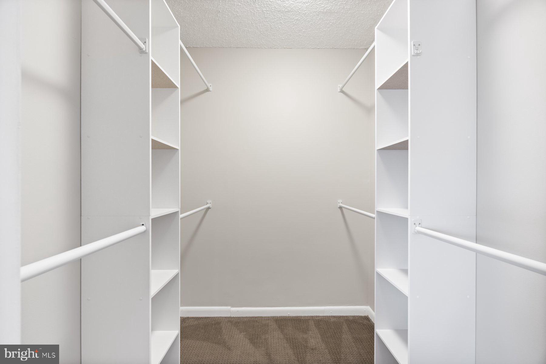 205 East Joppa Road, Unit 2403 Towson, MD 21286 - Photo 25 of 48 a view of staircase with white walls and door