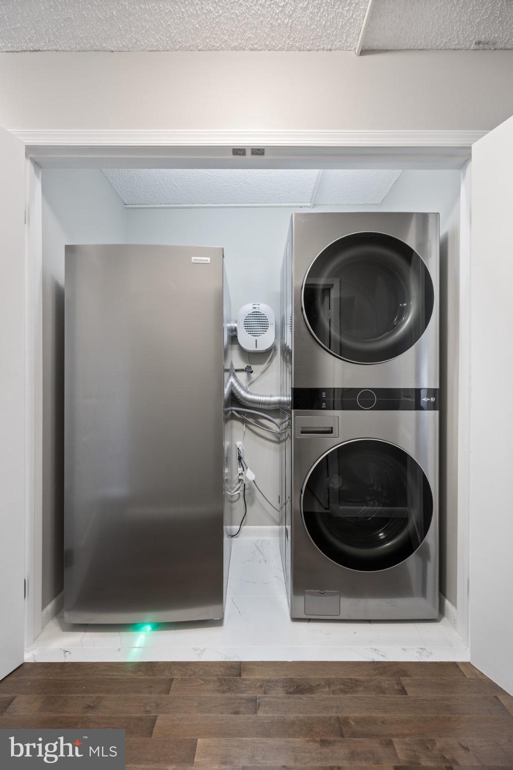 205 East Joppa Road, Unit 2403 Towson, MD 21286 - Photo 26 of 48 a close view of a utility room with dryer and washer
