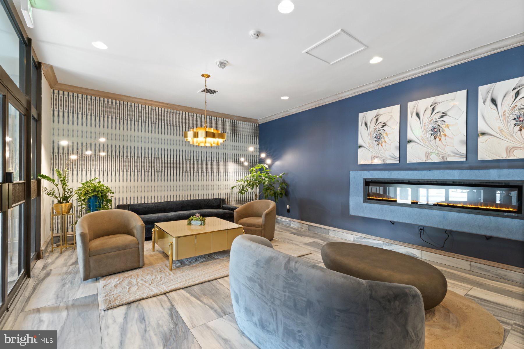 205 East Joppa Road, Unit 2403 Towson, MD 21286 - Photo 34 of 48 a living room with furniture and window