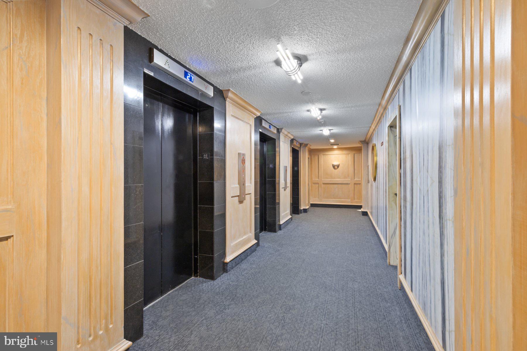 205 East Joppa Road, Unit 2403 Towson, MD 21286 - Photo 41 of 48 a view of hallway with livingroom