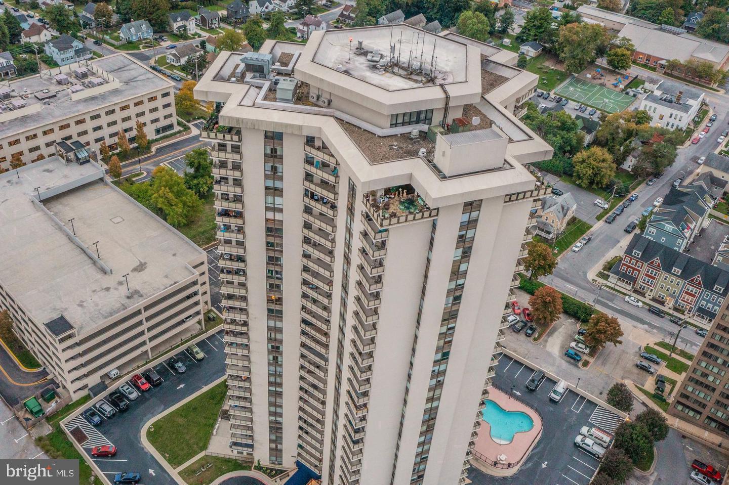 205 East Joppa Road, Unit 2403 Towson, MD 21286 - Photo 43 of 48 an aerial view of a residential apartment building with a yard