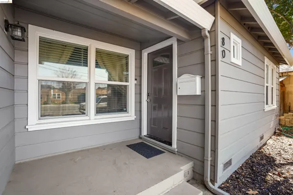 a view of front door and porch