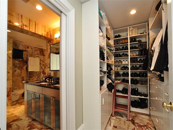 45 Parley Avenue Boston, MA 02130 - Photo 12 of 28 a view of walk in closet with clothes and shoes