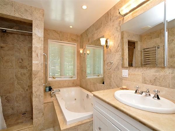 45 Parley Avenue Boston, MA 02130 - Photo 13 of 28 a bathroom with a tub sink and mirror