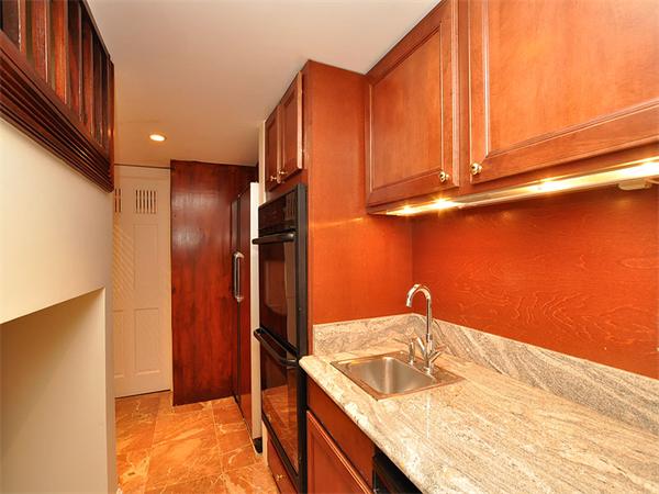 45 Parley Avenue Boston, MA 02130 - Photo 23 of 28 a kitchen with stainless steel appliances granite countertop a sink and a refrigerator