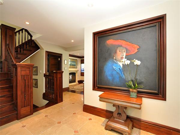 45 Parley Avenue Boston, MA 02130 - Photo 5 of 28 a living room with a painting on the wall and a flat screen tv