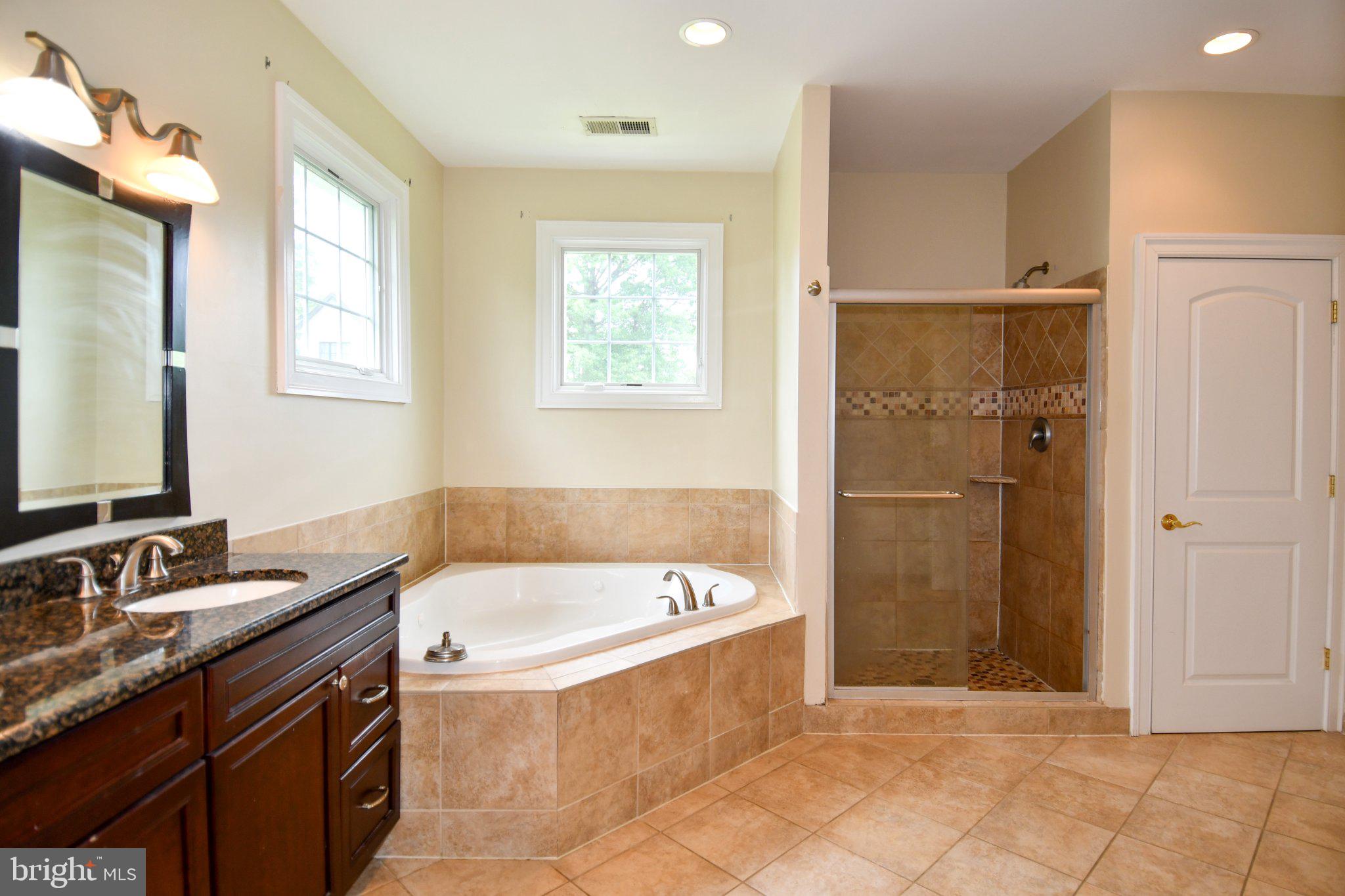 1924 Leonard Road Falls Church, VA 22043 - Photo 37 of 61 Elegant bathroom with natural light.
