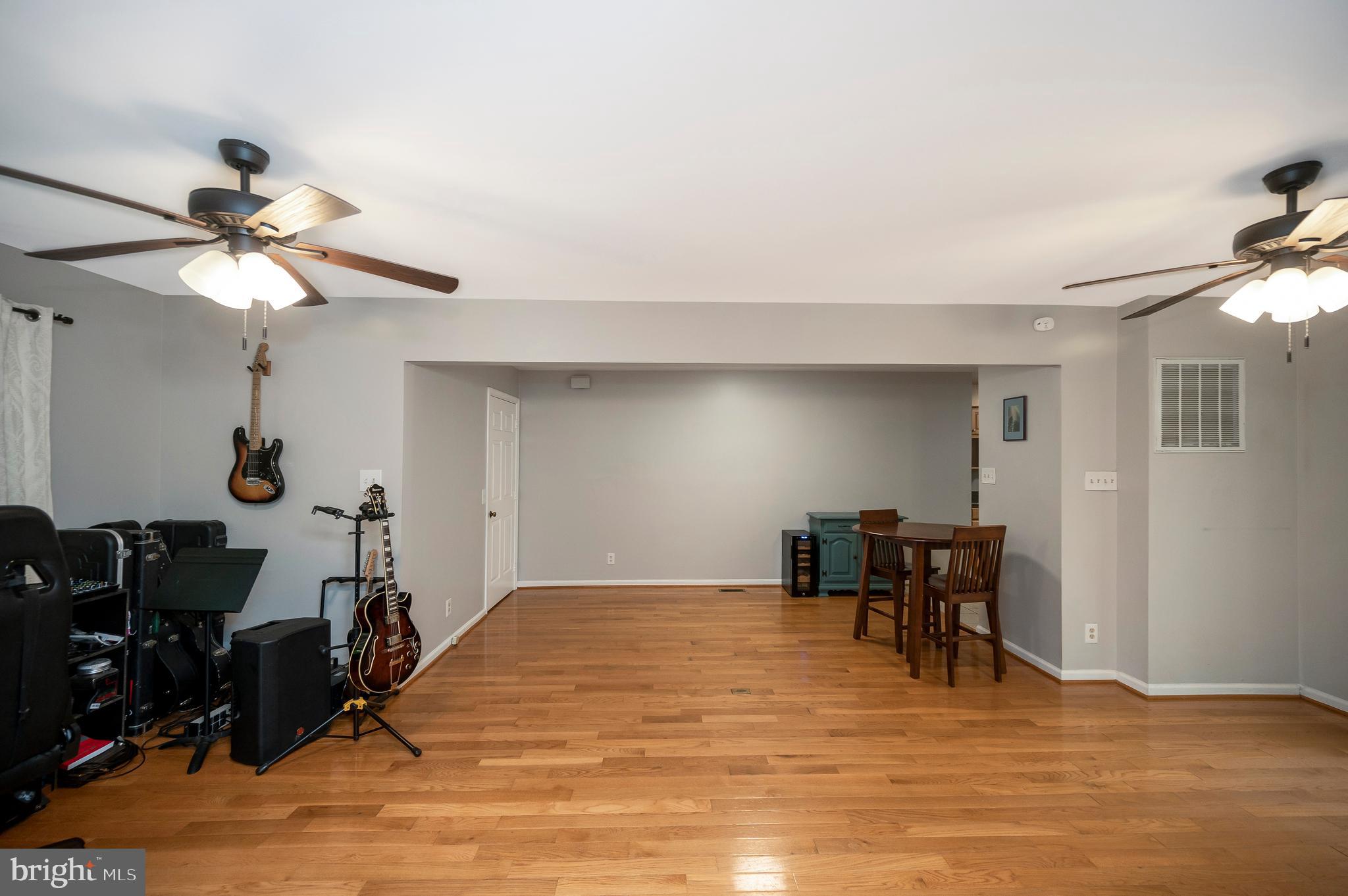 679 Cropp Road Fredericksburg, VA 22406 - Photo 24 of 39 a view of a room with gym equipment and a window