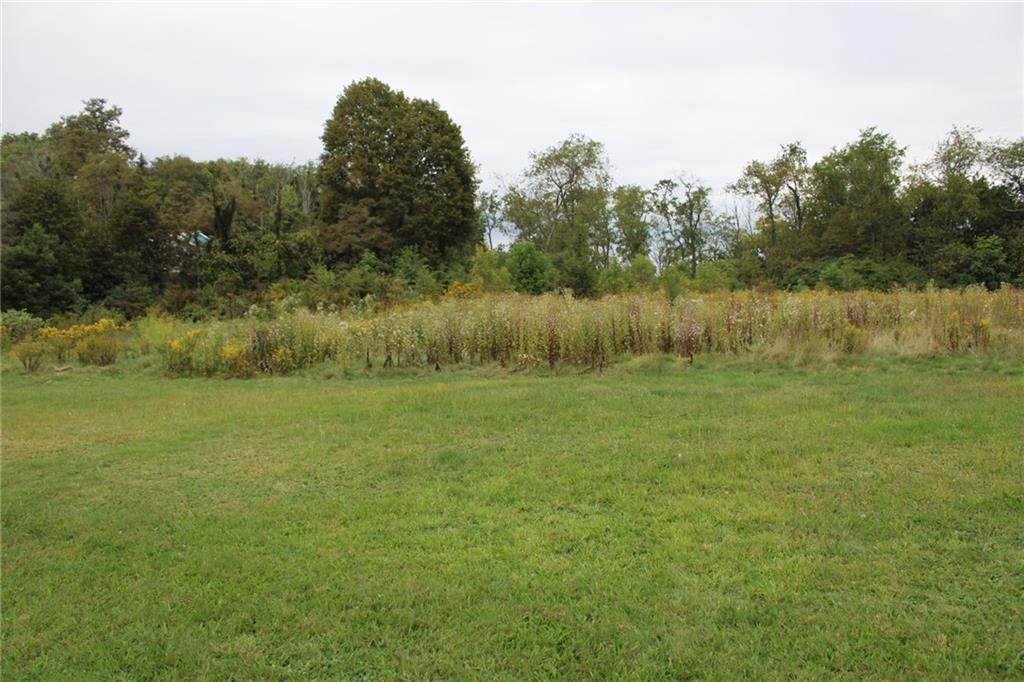 2101 Butler Logan Road Tarentum, PA 15084 - Photo 4 of 13 a view of a lake with houses in the back