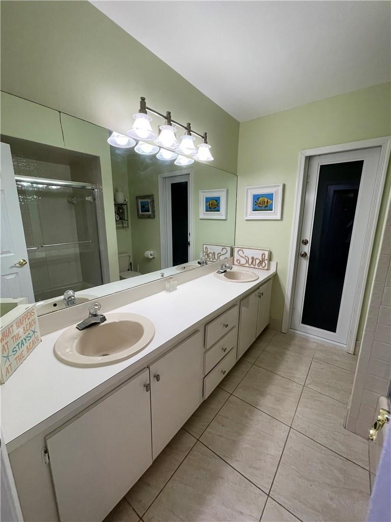 2358 Northwest 31st Street Boca Raton, FL 33431 - Photo 11 of 11 a bath room with sink and mirror