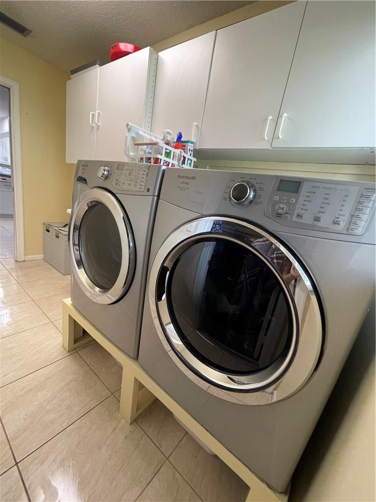 2358 Northwest 31st Street Boca Raton, FL 33431 - Photo 5 of 11 a utility room with dryer and washer
